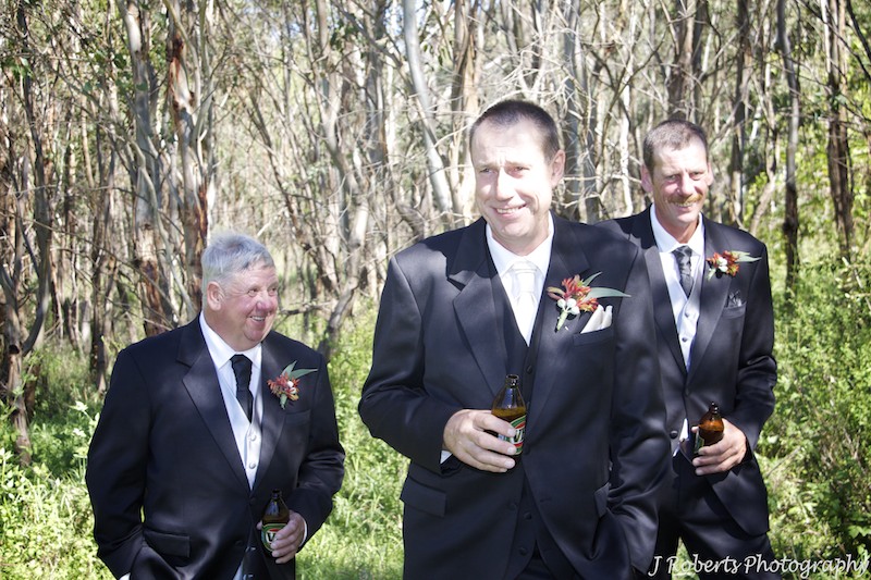 Groom and groomsmen having a beer - wedding photography sydney